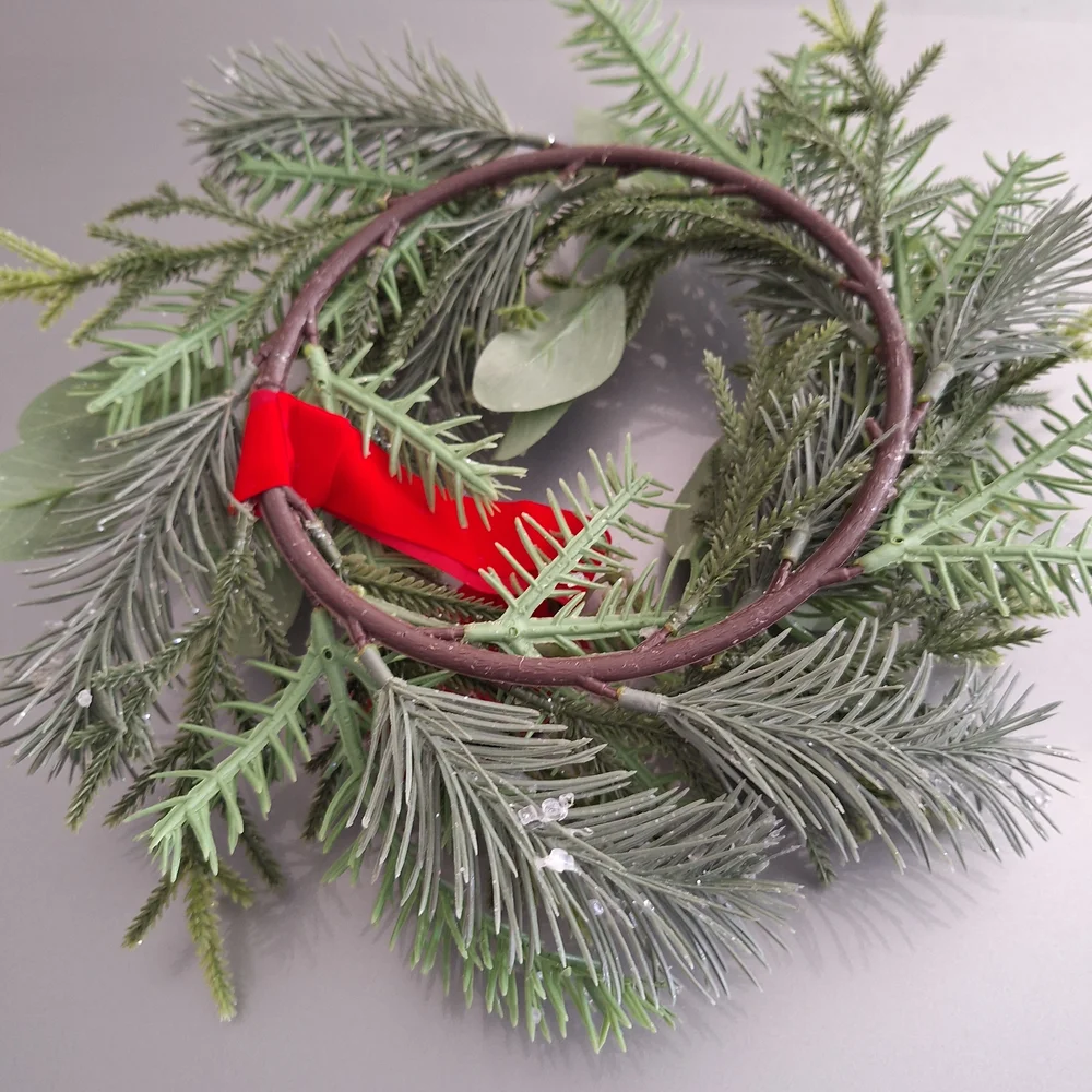 Ashland Frosted Green Pine Wreath with Red Bow Accent